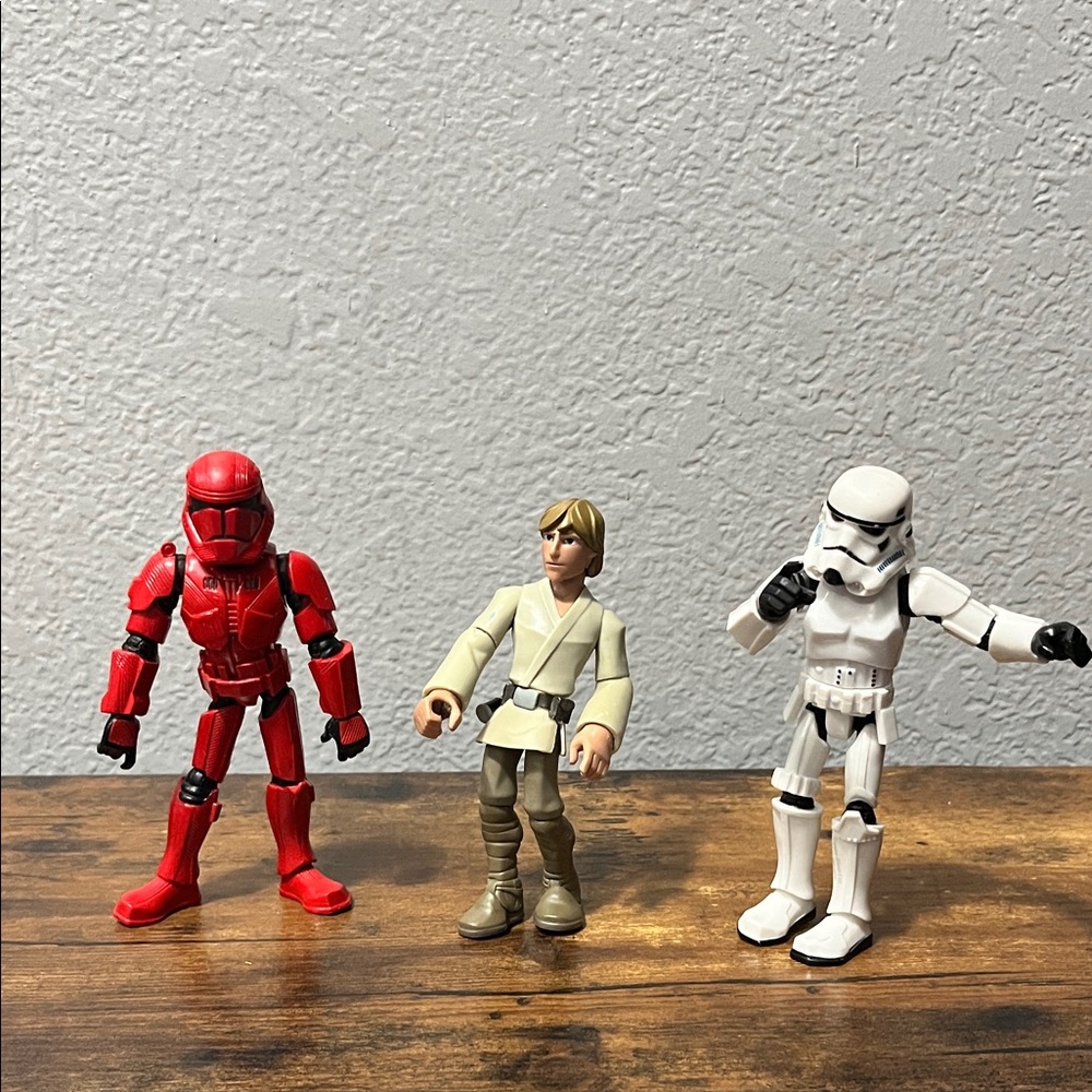 Star Wars Action Figure Trio - Red, Tan, and White